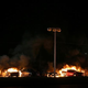 A row of cars burn at a used-car lot during a demonstration on Nov. 25, 2014, in Ferguson, Mo.
Justin Sullivan/Getty Images